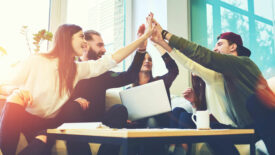 ASA News 6 feature image of group of people high-fiving