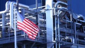 American flag by a commercial AC unit